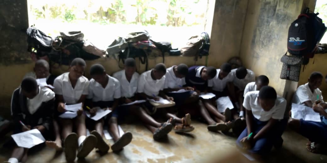 Students on bare floor