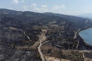 Burnt hillsides are seen following a wildfire near the village of Rovies on the island of Evia, Greece, August 12, 2021. Picture taken with a drone. REUTERS/Alkis Konstantinidis