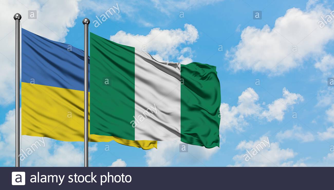 ukraine-and-nigeria-flag-waving-in-the-wind-against-white-cloudy-blue-sky-together-diplomacy-concept-international-relations-2ADPW4M