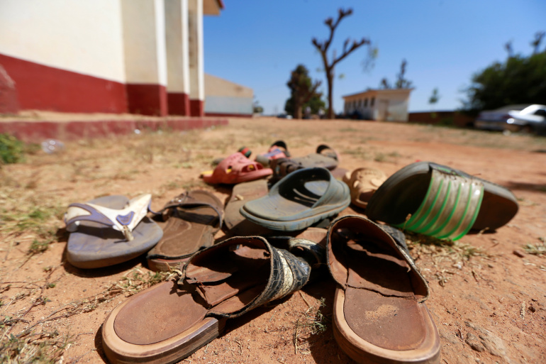 A collection of student footwears left behind after gunmen abducted students at the Government Science school in Kankara