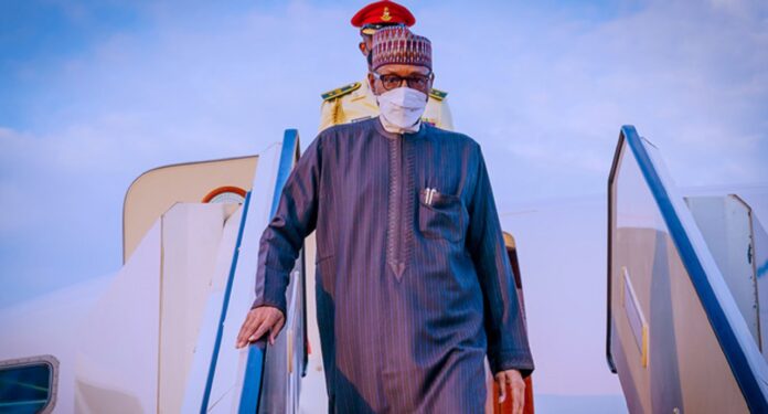 Buhari-arrives-in-abuja-696×375