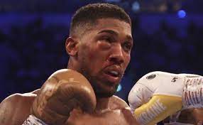 Devastated Joshua heads to hospital to check eye socket after losing titles
