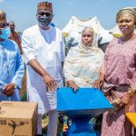 Kwara Governor Abdulrahman Abdulrazaq (2nd L) presenting the gifts