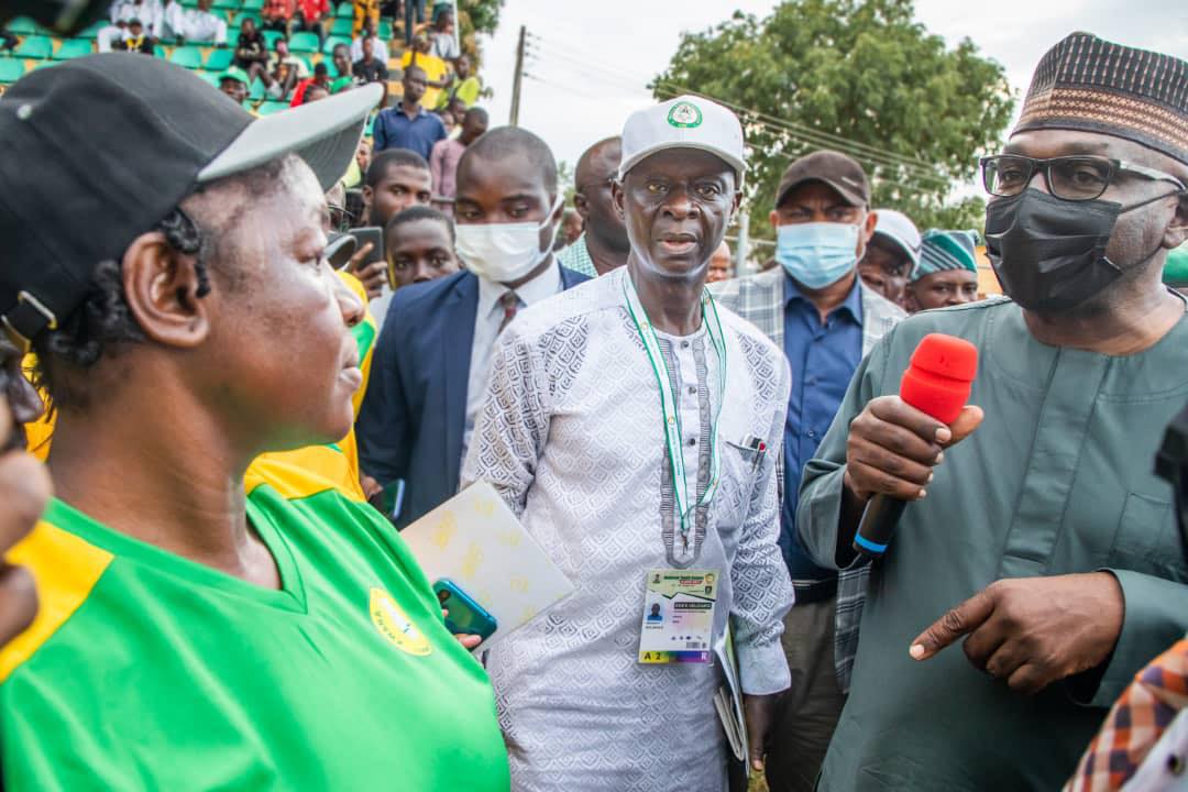 L-R: Squash coach Balikis Mogaji; Chairman Kwara State Sports Commission Bola Mogaji; and Governor Abdulrahman AbdulRazaq during the closing ceremony of the 6th edition of the Annual National Youth Games Ilorin 2021 in University of Ilorin, Ilorin, Kwara State on Tuesday