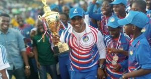 A young Delta State athlete and his coach celebrate victory at the National Youth Games in Ilorin