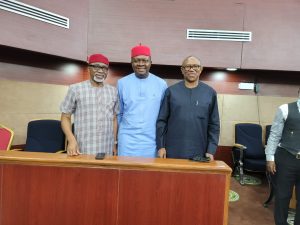 Valentine Ozigbo (middle) flanked by Mr Peter Obi (right) and Senate Minority Leader Senator Enyinnaya Abaribe (left)