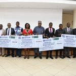 L-R: Mohammed Babajika, Director (Licensing and Authorisation), Nigerian Communications Commission (NCC); Ismail Adedigba, Deputy Director (Policy Competition and Economic Analysis); Dr Ikechukwu Adinde, Director (Public Affairs); MarcPatrick Efevuriri Efeni; Esther Gbeja; Prof Umar Garba Danbatta, NCC Executive Vice Chairman/CEO; Edosa Moses Nosa; Nasiru Abdulkarim; Engr Edoyemi Ogoh, Deputy Director (Technical Standard and Network Integrity) and Chairman of the Essay Review Committee; Yakubu Gontor, Director (Financial Services); Ephraim Nwokonneya, Director (Compliance Monitoring and Enforcement)