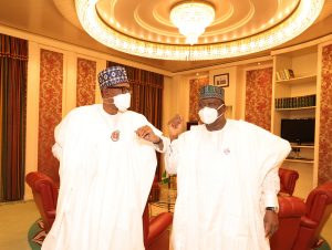 President Muhammadu Buhari (L), Senate President Ahmad Lawan (R)