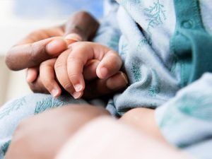 black_parent_and_child_holding_hands_closeup-732×549-thumbnail-732×549