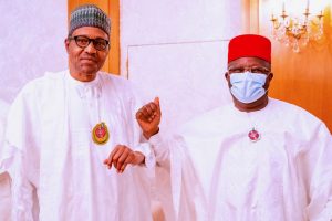 President Muhammadu Buhari (L), Ebonyi Governor David Umahi (R)