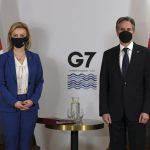 Britain’s Foreign Secretary Liz Truss, left, and US Secretary of State Antony Blinken, wearing face coverings to combat the spread of the coronavirus, pose for a photograph before a bilateral meeting ahead of the G7 foreign ministers summit in Liverpool, England, Friday, Dec. 10, 2021. – Blinken arrived in Britain for a G7 ministers’ meeting before visiting Indonesia, Malaysia and Thailand. (Olivier Douliery/Pool Photo via AP)