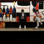 People wearing face masks to help curbing COVID-19 virus spread wait for a train at a subway station in Lisbon, Tuesday, Dec. 7, 2021. Despite having one of the highest vaccination rates in Europe, with 86.6% of its 10.3 million people inoculated, Portugal is scaling up its pandemic response amid the emergence of the omicron variant. (AP Photo/Armando Franca)