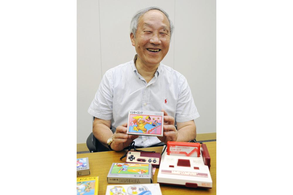 Masayuki Uemura, a Japanese home computer game pioneer whose Nintendo consoles sold millions of units worldwide, poses for a photo in Japan on July 10, 2013. Uemura, the lead architect behind Nintendo Co.’s trailblazing home game consoles, died Monday, Dec. 6, 2021, Ritsumeikan University said in a statement. He was 78. The cause of his death was not released. (Kyodo News via AP)