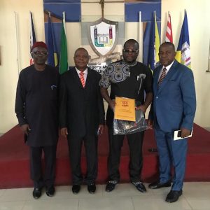 Dr Obi with the VC, Chancellor, Deputy Vice Chancellor and Registrar after presentation of the award