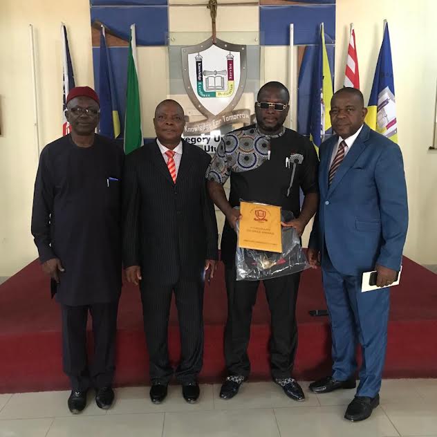 Dr Obi with the VC, Chancellor, Deputy Vice Chancellor and Registrar after presentation of the award