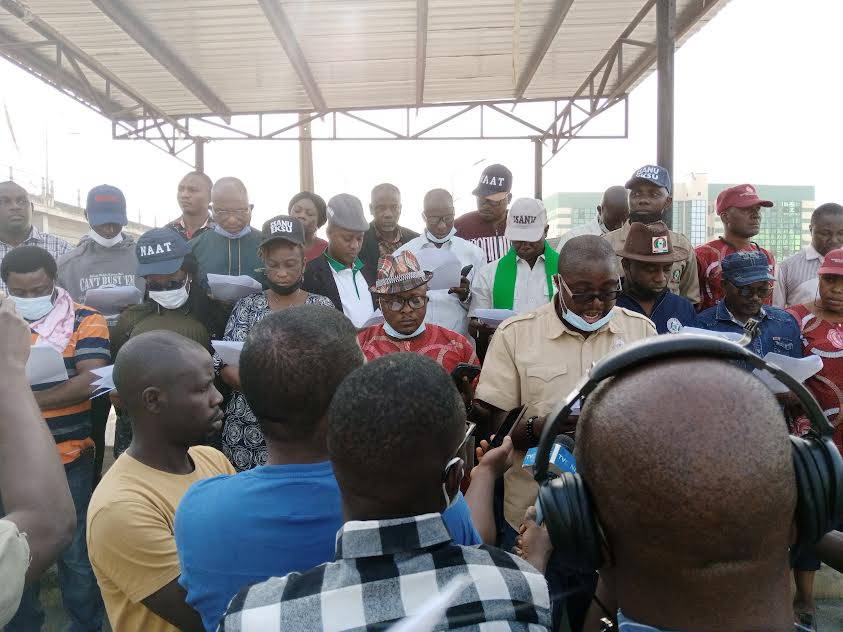 Arogundade flanked by labour leaders while addressing newsmen in Ado-Ekiti