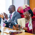 Lagos Governor Babajide Sanwo-Olu (L), One-day Governor Miss Jemimah Marcus (R)