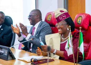 Lagos Governor Babajide Sanwo-Olu (L), One-day Governor Miss Jemimah Marcus (R)