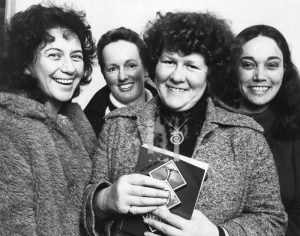 Novelist Keri Hulme, second from right, poses with Spiral Publishing collective members Miriama Evans, left, Marian Evans and Irihapeti Ramsden, right, in Wellington, New Zealand on July 16, 1984. Hulme, the New Zealander whose 1984 novel The Bone People won the Man Booker Prize died on Monday, Dec. 27, 2021. She was 74. (NZME via AP)
