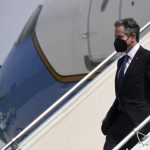 U.S. Secretary of State Antony Blinken arrives at the international airport in Jakarta on Monday, Dec. 13, 2021. Blinken arrives in Indonesia on his first stop of a three-nation tour across Southeast Asia. (Olivier Douliery/Pool Photo via AP)