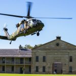 In this photo released by the Australian Department of Defence, an Australian Army S-70A-9 Black Hawk helicopter lands at Victoria Barracks in Sydney, Australia, Friday, Dec. 10, 2021. Australia’s military said Friday, Dec. 10, 2021, it plans to ditch its fleet of European-designed Taipan helicopters and instead buy U.S. Black Hawks and Seahawks choppers because the American machines are more reliable. (Cpl. Dustin Anderson/Department of Defence via AP)