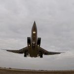 FILE – In this photo taken from video and released by Russian Defense Ministry Press Service on Wednesday, Nov. 10, 2021, a long-range Tu-22M3 bomber of the Russian Aerospace Forces takes-off to patrol in the airspace of Belarus, from an airfield in Russia. A pair of nuclear-capable Russian long-range bombers has patrolled the skies over Belarus Saturday on a mission intended to underline close defense ties between the two allies amid tensions with the West. The Russian Defense Ministry said two Tu-22M3 flew a four-hour mission to practice “performing joint tasks with the Belarusian air force and air defense.” (Russian Defense Ministry Press Service via AP, File)