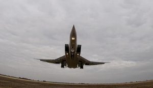 FILE – In this photo taken from video and released by Russian Defense Ministry Press Service on Wednesday, Nov. 10, 2021, a long-range Tu-22M3 bomber of the Russian Aerospace Forces takes-off to patrol in the airspace of Belarus, from an airfield in Russia. A pair of nuclear-capable Russian long-range bombers has patrolled the skies over Belarus Saturday on a mission intended to underline close defense ties between the two allies amid tensions with the West. The Russian Defense Ministry said two Tu-22M3 flew a four-hour mission to practice “performing joint tasks with the Belarusian air force and air defense.” (Russian Defense Ministry Press Service via AP, File)