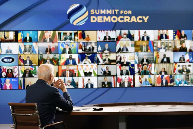 President Joe Biden speaks from the South Court Auditorium on the White House complex in Washington, Thursday, Dec. 9, 2021, for the opening of the Democracy Summit.The two-day virtual summit is billed as an opportunity for leaders and civil society experts from some 110 countries to collaborate on fighting corruption and promoting respect for human rights. (AP Photo/Susan Walsh)