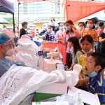FILE PHOTO: Mass testing for the coronavirus disease (COVID-19) at a stadium in Guangzhou