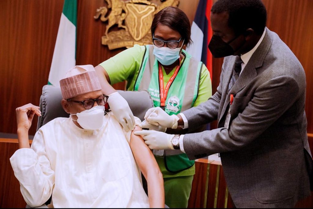 President Muhammadu Buhari receiving his COVID-19 vaccine booster shot
