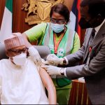 President Muhammadu Buhari receiving his COVID-19 vaccine booster shot