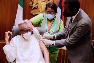 President Muhammadu Buhari receiving his COVID-19 vaccine booster shot