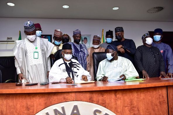 Kaduna Governor Nasir El-Rufai (seated L)