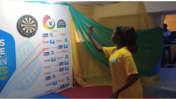 Double Gold medalist 14-year-old Ayomide Ogunnowo on the Darts Court at the Lagos State Open Darts Championships, held at the Sports Bar, Teslim Balogun Stadium, Surulere, Lagos