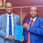 UNIZIK VC, Prof. Charles Esimone (R) and the CEO of Bionomics Nigeria Ltd, Mr Onyedika Ugochukwu after signing an MoU TO mount CCTV cameras in the university