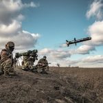 In this image released by Ukrainian Defense Ministry Press Service, Ukrainian soldiers use a launcher with US Javelin missiles during military exercises in Donetsk region, Ukraine, Thursday, Dec. 23, 2021. (Ukrainian Defense Ministry Press Service via AP)