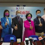 Members of New People’s Party, from left, Judy Chan, Eunice Yung, Lai Tung-kwok, Regina Ip, Dominic Lee and Marcus Liu pose for a photograph during a press conference after winning the legislative election in Hong Kong, Monday, Dec. 20, 2021. Pro-Beijing candidates dominated Hong Kong’s legislative elections, beating out moderates and independents in the city’s first public poll after Beijing passed a resolution to amend the city’s election laws. (AP Photo/Kin Cheung)