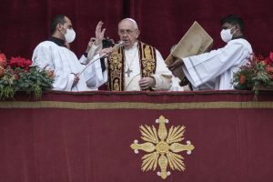 Pope Francis delivers the Urbi et Orbi (Latin for ‘to the city and to the world’ ) Christmas’ day blessing from the main balcony of St. Peter’s Basilica at the Vatican, Saturday, Dec. 25, 2021. (AP Photo/Gregorio Borgia)