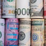 money-cash-banknotes-currency-international-Dilok-adobe