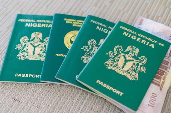 nigerian-passports-with-naira-650×430