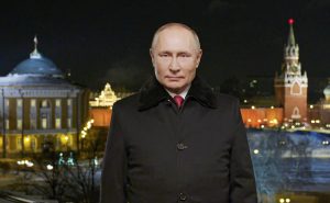 In this photo released by Kremlin Press service on Saturday, Jan. 1, 2022, Russian President Vladimir Putin speaks during a recording of his annual televised New Year’s message on New Year’s eve in the Kremlin in Moscow, Russia. Russian President Vladimir Putin on Friday wished Russians positive changes in the new year, hailing their solidarity and strength in the face of tough challenges like the coronavirus pandemic. President Vladimir Putin is wishing Russians a happier new year, hailing their solidarity and strength in the face of tough challenges like the coronavirus pandemic. In a televised address broadcast just before midnight in each of Russia’s 11 time zones, Putin said the nation has faced “colossal challenges but has learned to live in those harsh conditions and solve difficult tasks thanks to our solidarity.” Putin’s address to the nation on Friday was broadcast hours after his phone call with U.S. President Joe Biden, which focused on next month’s talks to discuss Moscow’s demand for Western security guarantees amid a Russian troop buildup near Ukraine.(Kremlin Pool Photo via AP)