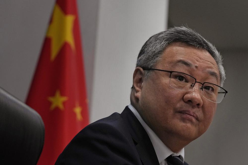 Fu Cong, the director general of the Foreign Ministry’s arms control department, attends a press conference on nuclear arms control in Beijing, China, Tuesday, Jan. 4, 2022. The top Chinese arms control official denied Tuesday that his government is rapidly expanding its nuclear arsenal, though he said it is taking steps to ensure its nuclear deterrent remains viable in a changing security environment. (AP Photo/Ng Han Guan)