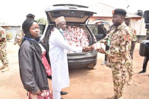 Military handing over intercepted illicit drugs in Plateau