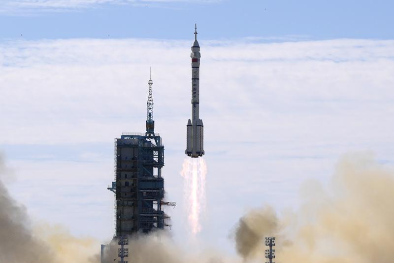 FILE – A Long March-2F Y12 rocket carrying a crew of Chinese astronauts in a Shenzhou-12 spaceship lifts off at the Jiuquan Satellite Launch Center in Jiuquan in northwestern China, Thursday, June 17, 2021. China has recommitted itself to completing its orbiting space station by the end of the year and says it is planning more than 40 launches for 2022, putting it roughly level with the United States. (AP Photo/Ng Han Guan, File)