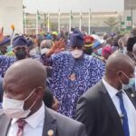Buhari-and-Abiodun-acknowledges-cheers-