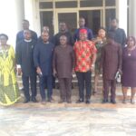 Chiji in a group photo with UNN officials