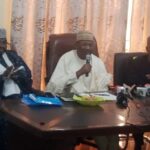 INEC Chairman Mahmood Yakubu (centre) at the meeting
