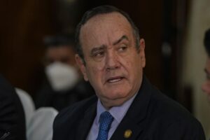 FILE – Guatemalan President Alejandro Giammattei meets U.S. Secretary of Homeland Security Alejandro Mayorkas at the Presidential House offices in Guatemala City, Tuesday, July 6, 2021. Guatemala has hired on Jan. 13, 2022, for $900,000 a major supporter of former President Donald Trump to seek influence with U.S. officials in an unusual lobbying contract paid for by its ally Taiwan, foreign lobby records show. (AP Photo/Moises Castillo, File)