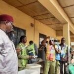 National Commissioner Barr Festus Okoye, observing the sorting and counting of  ballots at Okuku ward, Polling Unit 4, Ogoja