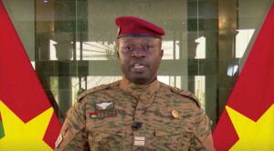 FILE PHOTO: The new military ruler of Burkina Faso, Lieutenant Colonel Paul-Henri Damiba, delivers a speech in Ouagadougou, Burkina Faso, January 27, 2022, in this screengrab taken from video